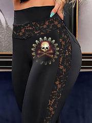 Pantalon sexy en patchwork de dentelle à imprimé tête de mort et os croisés
