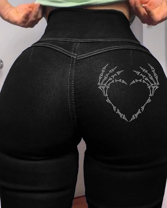 Pfirsichfarbene, hüftformende Jeans mit Skull Love-Print