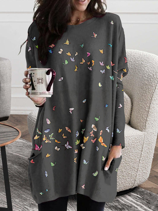 Pulloverkleid mit Seitentaschen und Schmetterlings-Print 