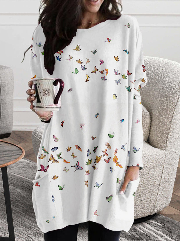 Pulloverkleid mit Seitentaschen und Schmetterlings-Print 