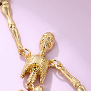 Boucles d'oreilles pendantes en métal avec crâne et squelette