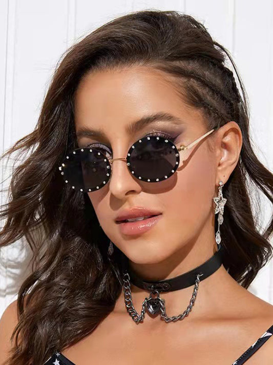 Ovale Sonnenbrille mit Diamanten 