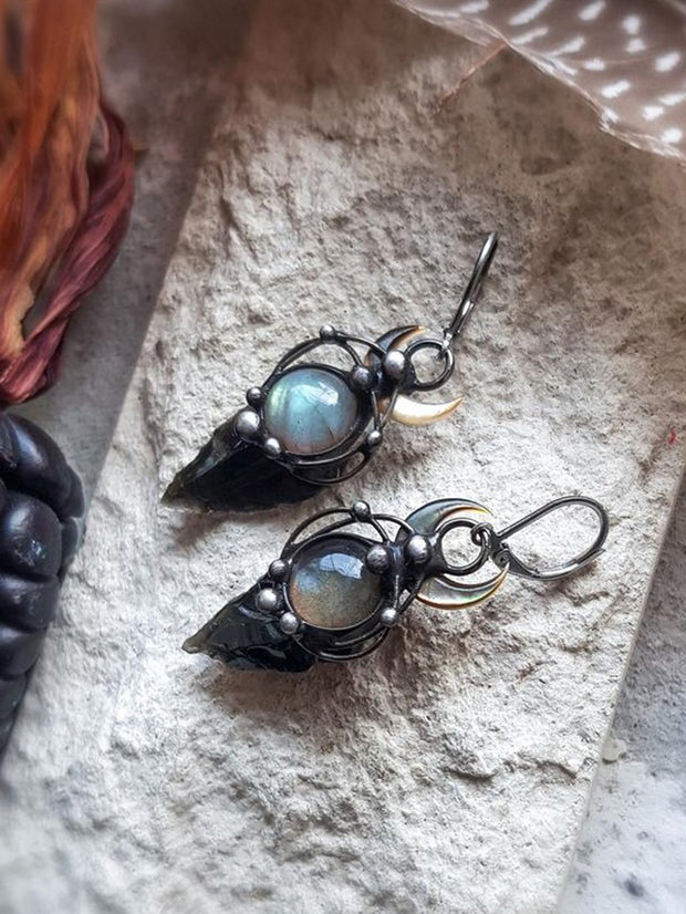 Boucles d'oreilles magiques en perles de flèche noire 