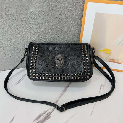 Embossed Skull Riveted Shoulder Bag