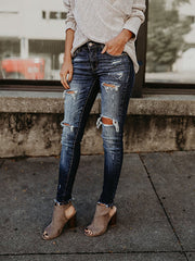 Zerrissene Jeans mit mittelhohem Bund für Damen 
