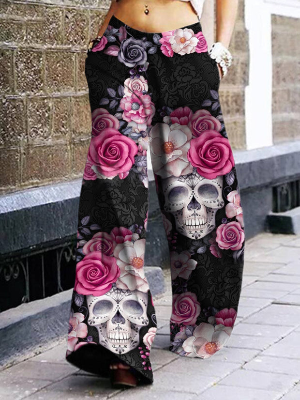 Pantalon large imprimé tête de mort et roses 