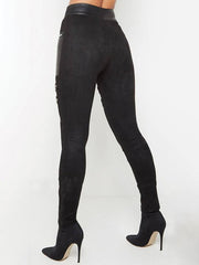 Schwarze Hose mit Reißverschluss und Patchwork-Einsatz aus Leder 