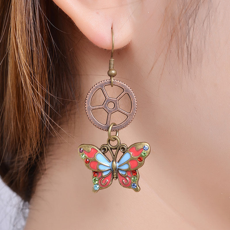 Boucles d'oreilles Steampunk à engrenages creux papillon 