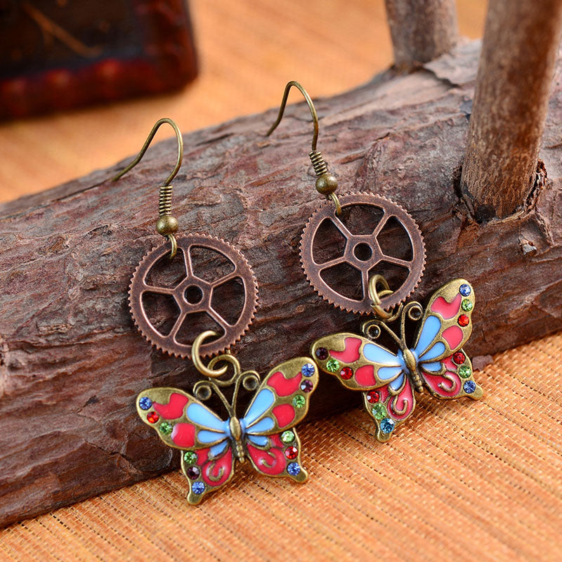 Boucles d'oreilles Steampunk à engrenages creux papillon 