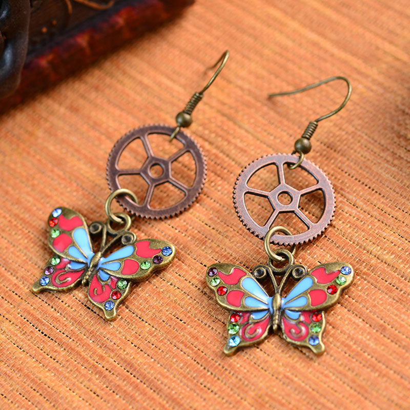 Boucles d'oreilles Steampunk à engrenages creux papillon 