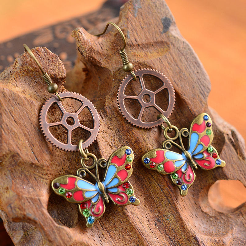 Boucles d'oreilles Steampunk à engrenages creux papillon 