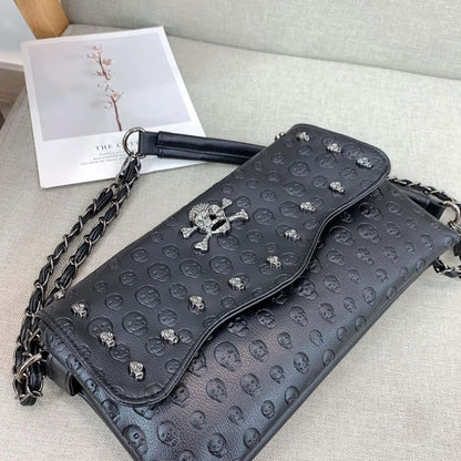 Embossed Riveted Skulls Shoulder Bag