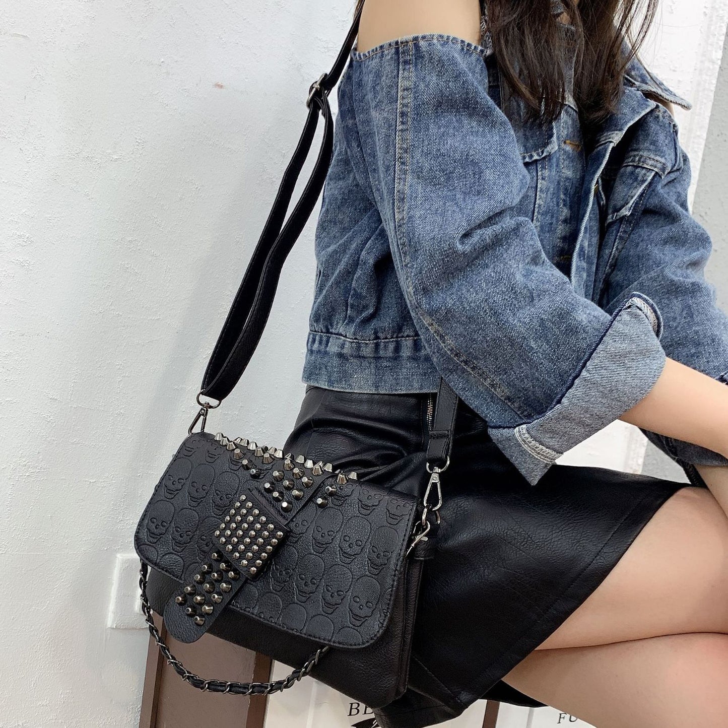 Riveted Embossed Skull Shoulder Bag