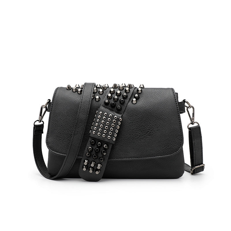 Riveted Embossed Skull Shoulder Bag