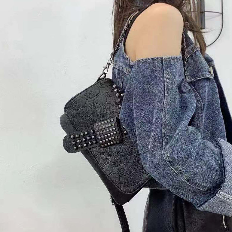 Riveted Embossed Skull Shoulder Bag