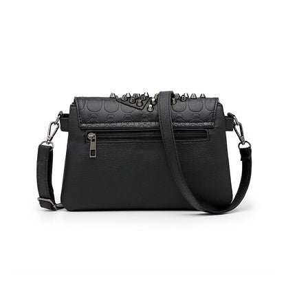 Riveted Embossed Skull Shoulder Bag